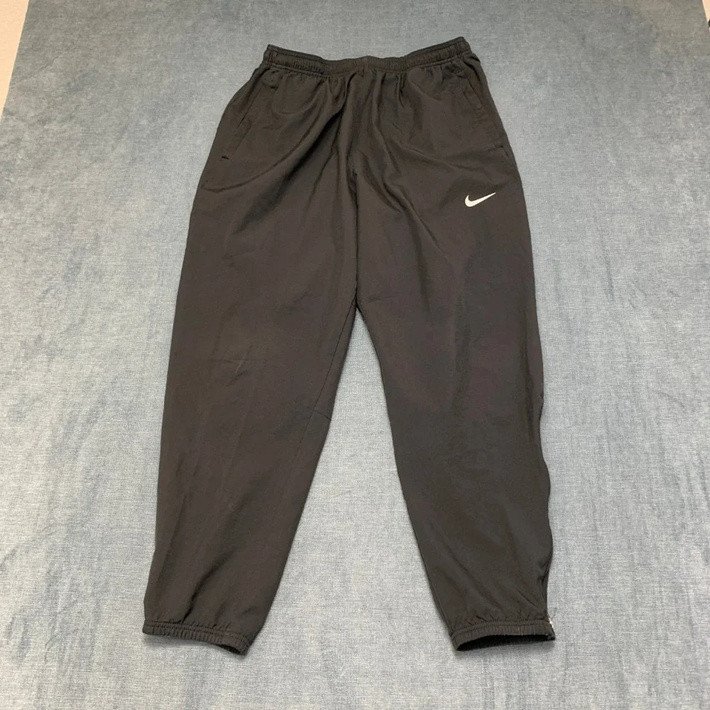 Nike Dri Fit Jogger Pants Womens XL 28x28 Black Swoosh Logo Tapered Leg Running